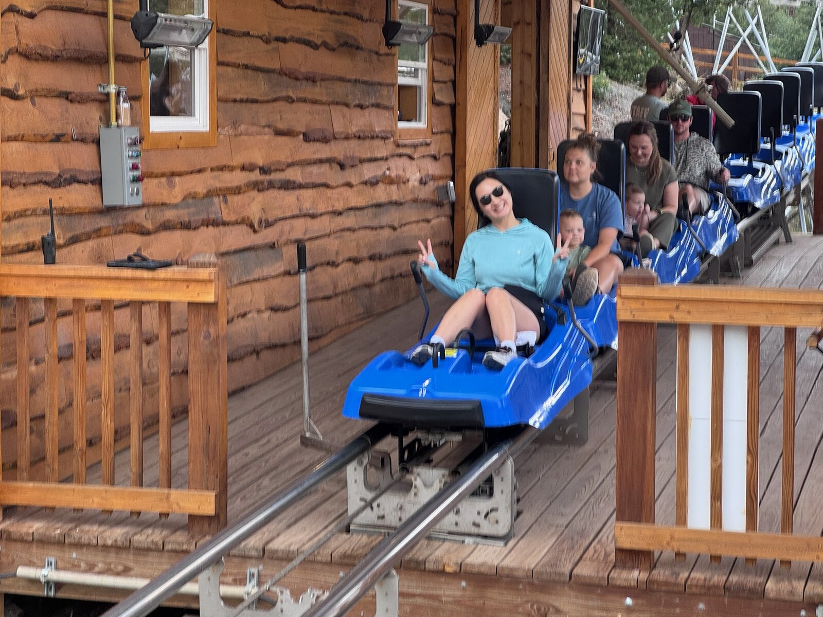 Molly starting a ride on the Ruidoso Winter Park mountain coaster